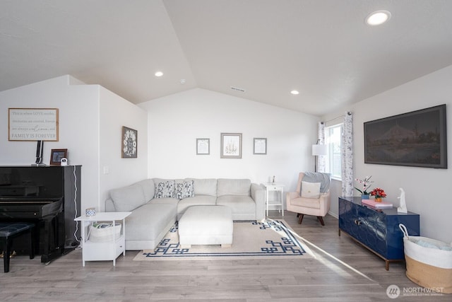 1205 W Sequoia Rd, Moses Lake, WA 98837 - living room with lofted ceiling, wood finished floors, and recessed lighting