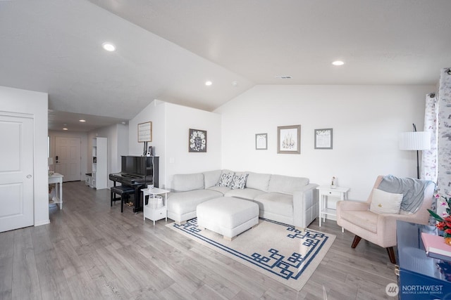 1205 W Sequoia Rd, Moses Lake, WA 98837 - living room featuring lofted ceiling, wood finished floors, and recessed lighting