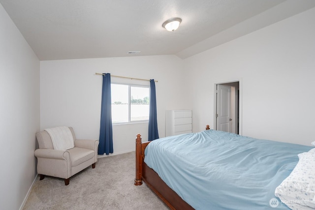 1205 W Sequoia Rd, Moses Lake, WA 98837 - carpeted bedroom featuring vaulted ceiling and baseboards