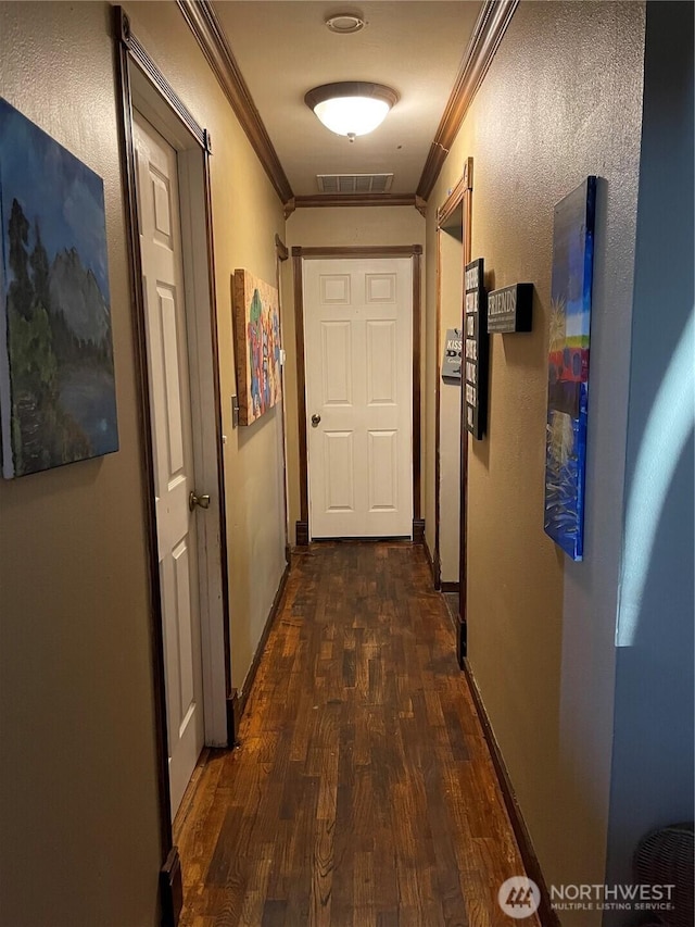 1610 M St NE, Auburn, WA 98002 - hallway with crown molding and dark wood-style flooring