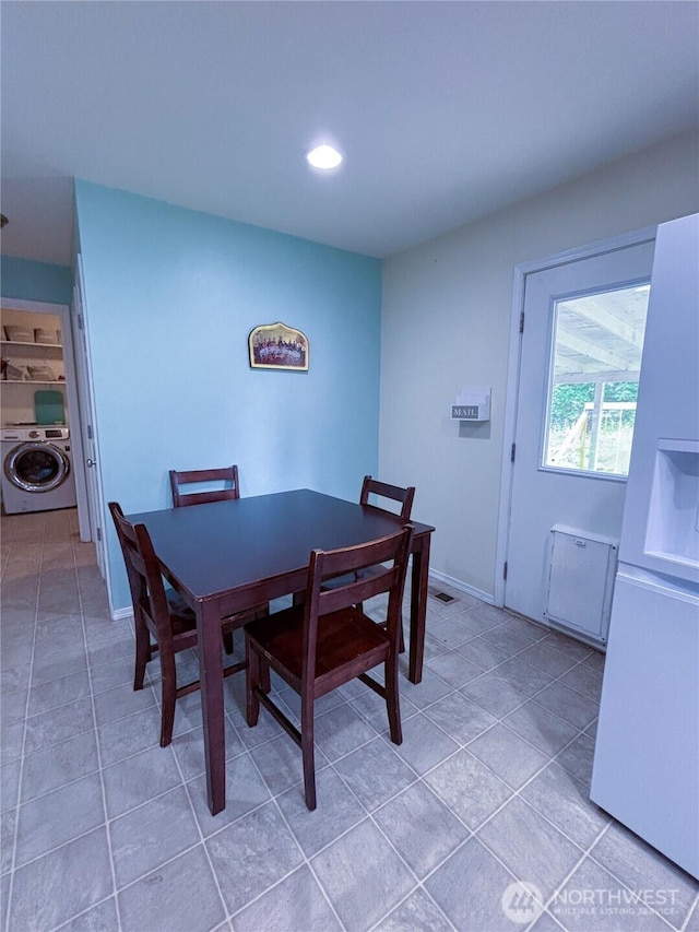 8389 SW Harmon St, Port Orchard, WA 98367 - dining room featuring washer / clothes dryer and recessed lighting