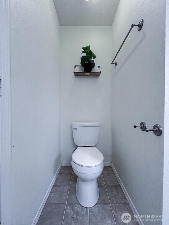 8389 SW Harmon St, Port Orchard, WA 98367 - bathroom with toilet and tile patterned flooring