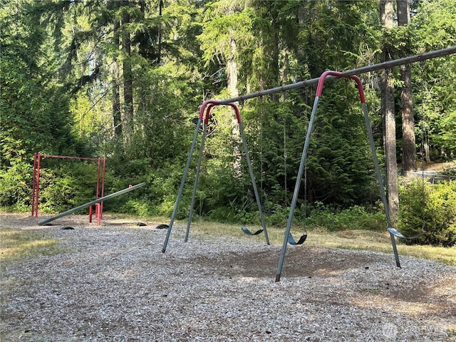 8389 SW Harmon St, Port Orchard, WA 98367 - communal playground featuring a wooded view