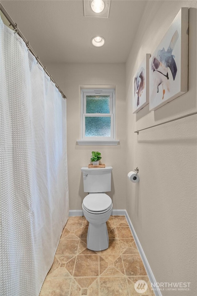 21945 Promontory Ct SE, Yelm, WA 98597 - full bathroom with tile patterned floors and curtained shower