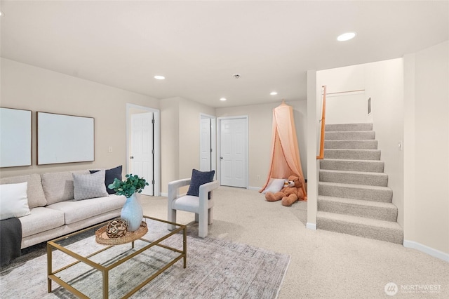 21945 Promontory Ct SE, Yelm, WA 98597 - carpeted living room featuring stairway and recessed lighting