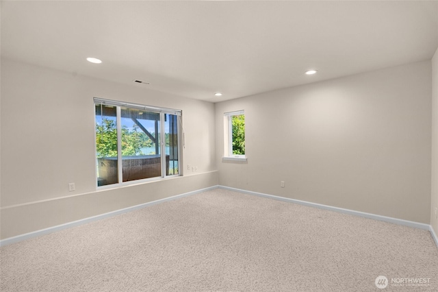 21945 Promontory Ct SE, Yelm, WA 98597 - carpeted empty room with recessed lighting