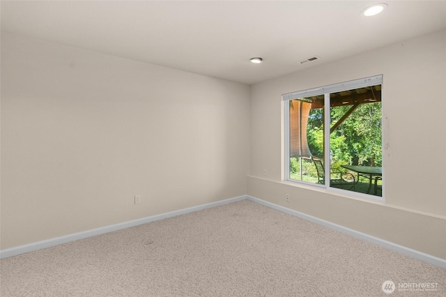 21945 Promontory Ct SE, Yelm, WA 98597 - unfurnished room featuring carpet flooring and recessed lighting