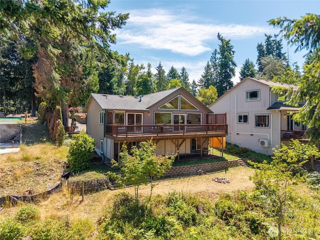 21945 Promontory Ct SE, Yelm, WA 98597 - back of house with a wooden deck