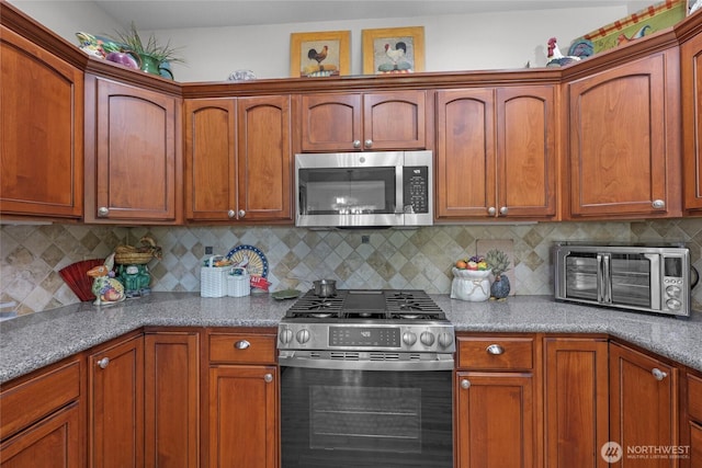 461 Klahhane Rd, Sequim, WA 98382 - kitchen featuring stainless steel appliances and backsplash