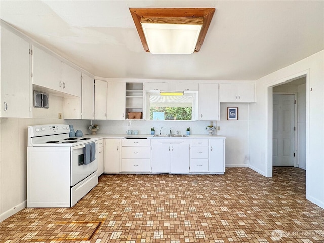 2310 S Laurel St, Port Angeles, WA 98362 - kitchen featuring electric range, white cabinets, light countertops, and open shelves