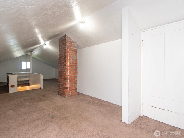 2310 S Laurel St, Port Angeles, WA 98362 - bonus room featuring carpet flooring and vaulted ceiling
