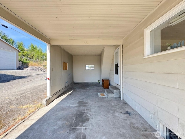 2310 S Laurel St, Port Angeles, WA 98362 - view of patio / terrace featuring a carport