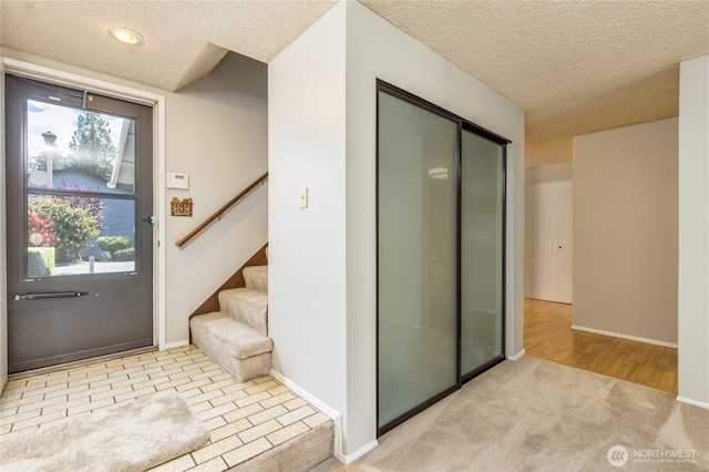 2913 27th St SE, Auburn, WA 98092 - bathroom featuring a textured ceiling and baseboards