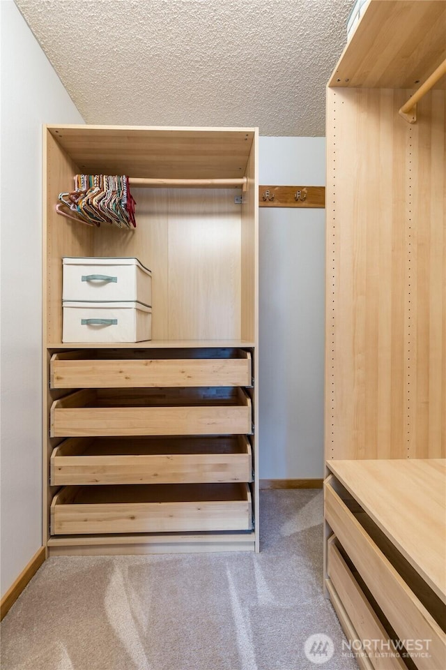 2913 27th St SE, Auburn, WA 98092 - spacious closet featuring carpet