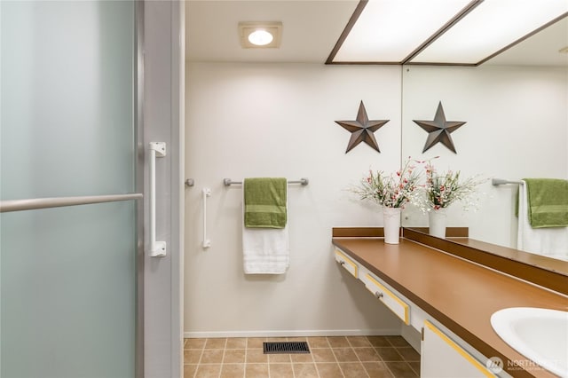 2913 27th St SE, Auburn, WA 98092 - bathroom with vanity and baseboards
