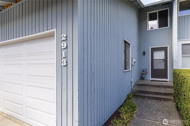 2913 27th St SE, Auburn, WA 98092 - doorway to property featuring an attached garage