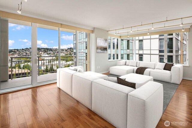 2600 2nd Ave Unit 2501, Seattle, WA 98121 - living room with rail lighting and wood finished floors