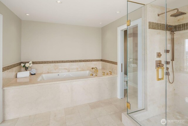 2600 2nd Ave Unit 2501, Seattle, WA 98121 - full bathroom with a garden tub, a stall shower, and recessed lighting