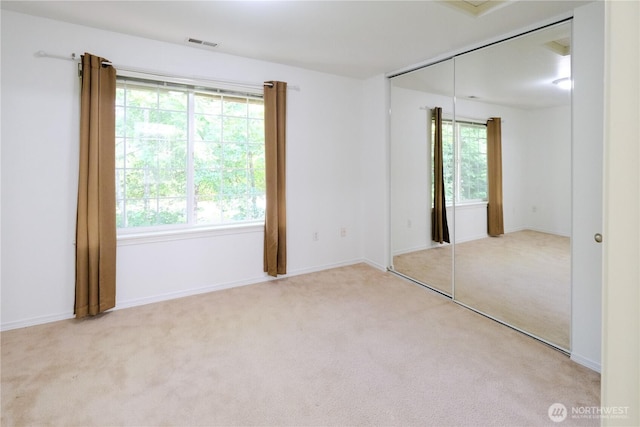 28710 S 34th Ave Unit B5, Auburn, WA 98001 - unfurnished bedroom with carpet and a closet