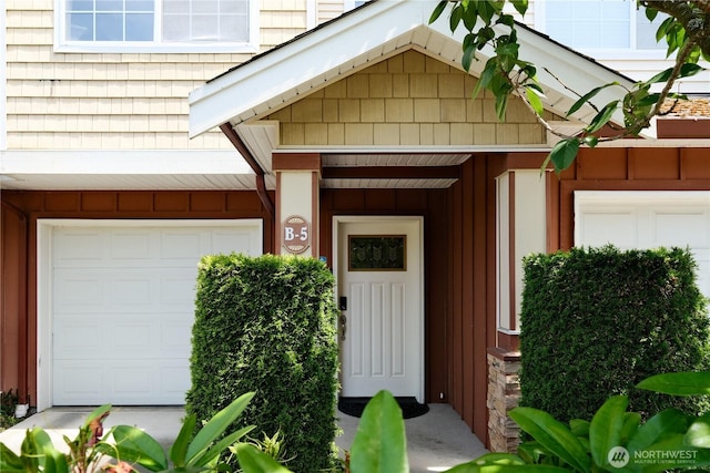28710 S 34th Ave Unit B5, Auburn, WA 98001 - doorway to property with a garage and board and batten siding