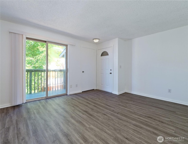 2716 S 256th Pl, Kent, WA 98032 - spare room featuring a textured ceiling and wood finished floors