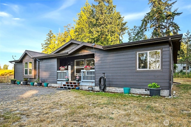 29 Sherburne Rd, Sequim, WA 98382 - view of front of house with covered porch and a front lawn