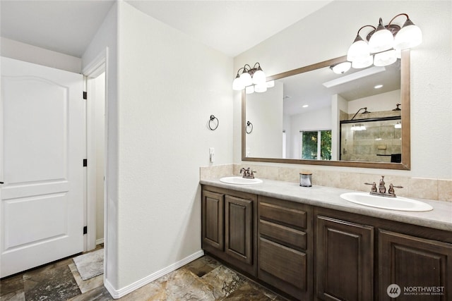 29 Sherburne Rd, Sequim, WA 98382 - bathroom featuring stone tile floors, double vanity, and a shower stall