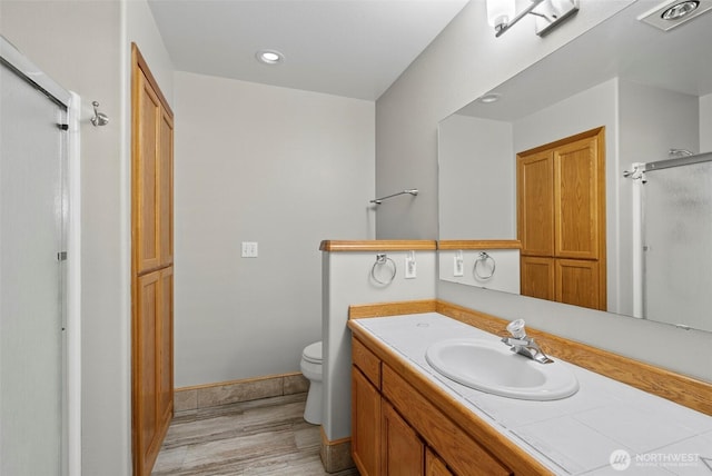 13019 NE 96th Way, Vancouver, WA 98682 - full bathroom with vanity, a stall shower, wood finished floors, and recessed lighting