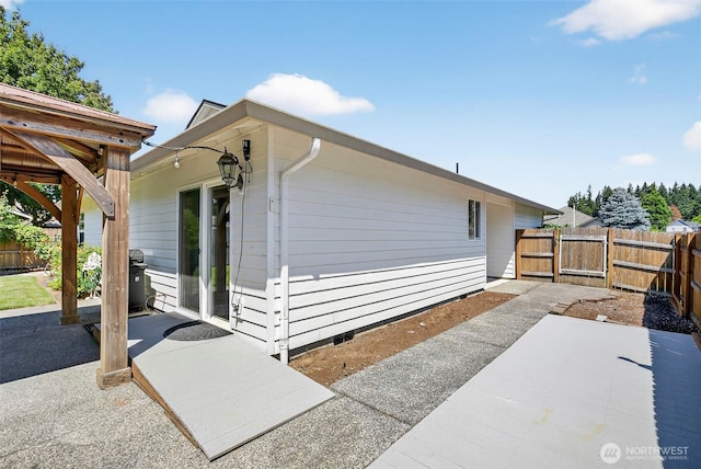 13019 NE 96th Way, Vancouver, WA 98682 - view of side of home featuring a patio