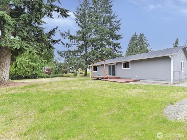 2705 181st Ave E, Lake Tapps, WA 98391 - view of grassy yard with a wooden deck