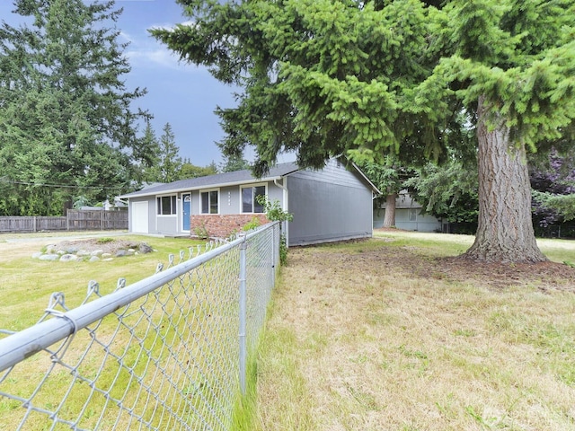 2705 181st Ave E, Lake Tapps, WA 98391 - view of front of property featuring an attached garage and brick siding