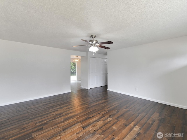 2705 181st Ave E, Lake Tapps, WA 98391 - empty room featuring a ceiling fan, dark wood finished floors, and a textured ceiling