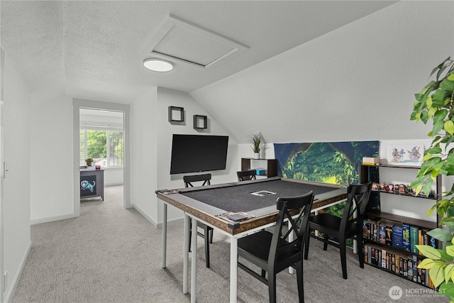 3738 E J St, Tacoma, WA 98404 - playroom with lofted ceiling, attic access, carpet flooring, and a textured ceiling