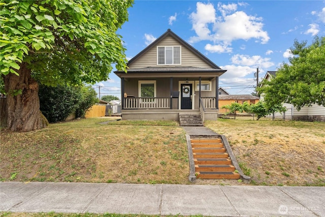 3738 E J St, Tacoma, WA 98404 - shotgun-style home featuring covered porch and stairway