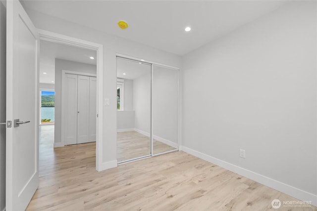 610 Northshore Dr Unit 6123, Bellingham, WA 98226 - unfurnished bedroom with light wood finished floors, recessed lighting, and a closet
