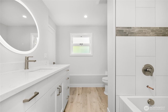 610 Northshore Dr Unit 6123, Bellingham, WA 98226 - bathroom with vanity, wood finished floors, washtub / shower combination, and recessed lighting