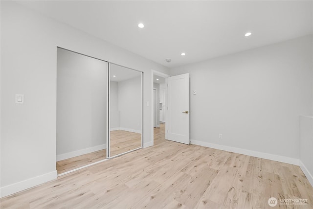 610 Northshore Dr Unit 6123, Bellingham, WA 98226 - unfurnished bedroom featuring recessed lighting, wood finished floors, and a closet