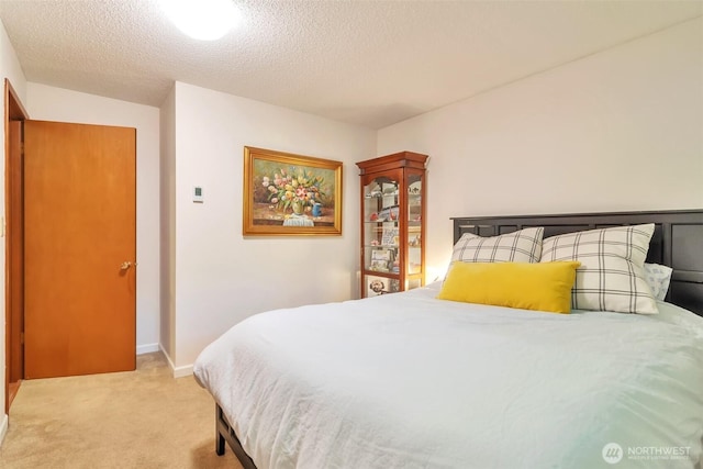 1515 NE 106th St, Seattle, WA 98125 - bedroom featuring light carpet and a textured ceiling