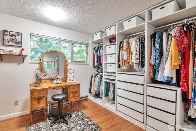 1515 NE 106th St, Seattle, WA 98125 - home office with a textured ceiling and wood finished floors