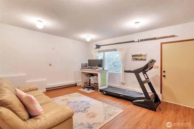 1515 NE 106th St, Seattle, WA 98125 - workout area with a baseboard radiator and wood finished floors