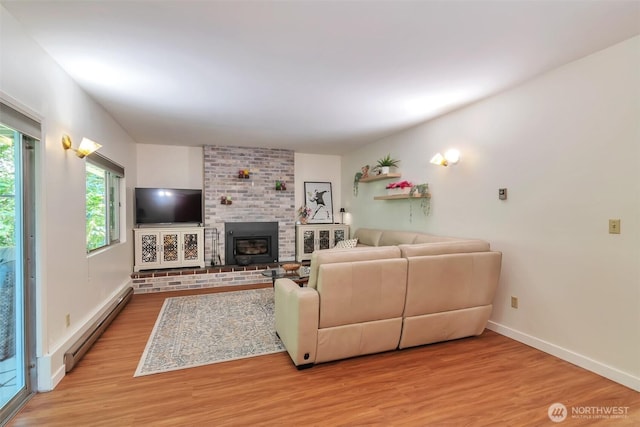 1515 NE 106th St, Seattle, WA 98125 - living area featuring a baseboard radiator and wood finished floors