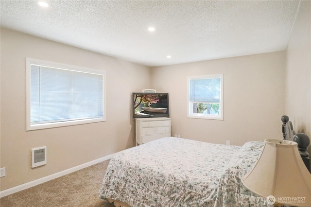 837 NW Duffy St, Chehalis, WA 98532 - carpeted bedroom featuring recessed lighting, heating unit, and a textured ceiling