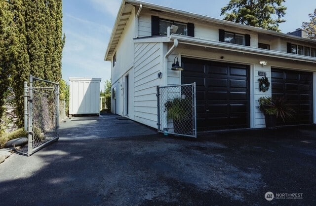 1327 Marie View St, Port Angeles, WA 98363 - view of side of property with a gate and driveway