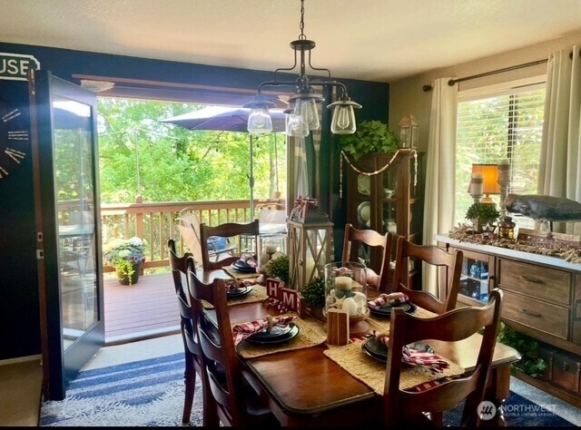 1327 Marie View St, Port Angeles, WA 98363 - dining room featuring a chandelier