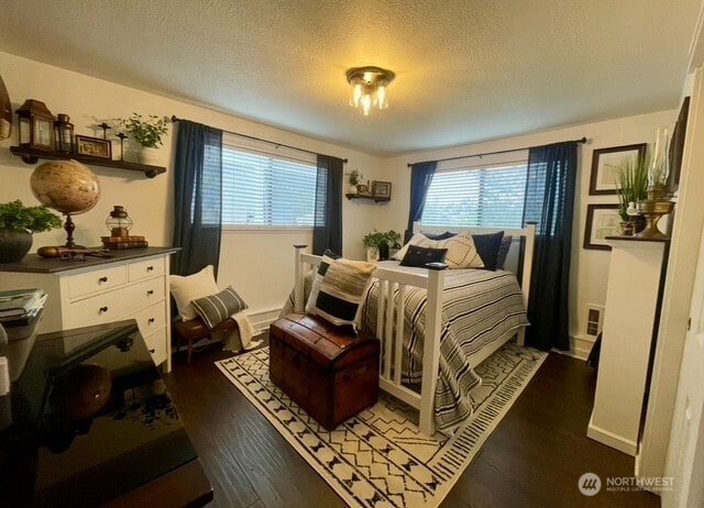 1327 Marie View St, Port Angeles, WA 98363 - bedroom with dark wood finished floors and a textured ceiling
