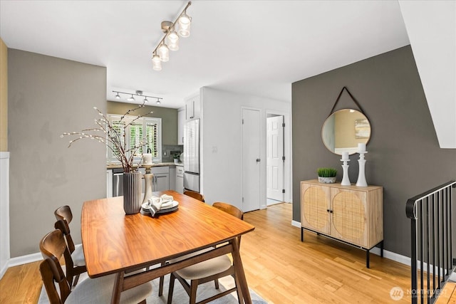728 NW 189th Ln, Shoreline, WA 98177 - dining space featuring light wood-style flooring and track lighting