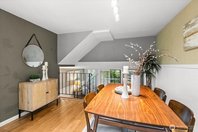 728 NW 189th Ln, Shoreline, WA 98177 - dining space featuring wood finished floors and a wainscoted wall