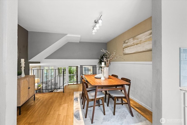 728 NW 189th Ln, Shoreline, WA 98177 - dining area featuring wood finished floors and a wainscoted wall