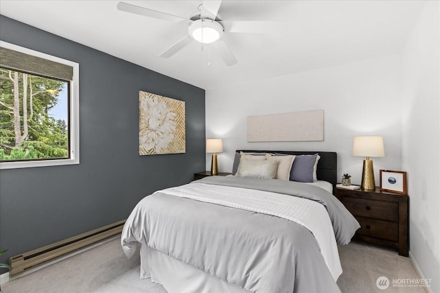 728 NW 189th Ln, Shoreline, WA 98177 - bedroom featuring light colored carpet, a baseboard radiator, and ceiling fan