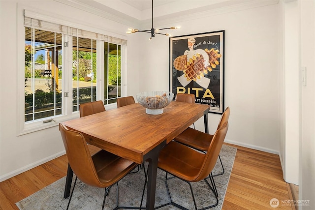 10261 NE 21st Pl, Bellevue, WA 98004 - dining area with light wood-style flooring, ornamental molding, and a chandelier